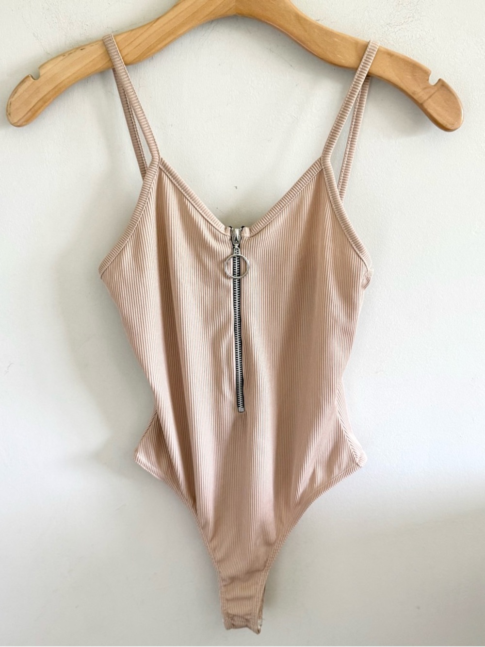 PrettyLittleThing Nude Ribbed Zip Front Thong Bodysuit | Size 2